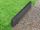 Bordure en basalte Takeda avec gazon et graviers